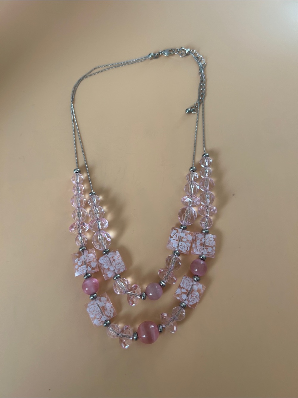 Triple-Strand Pink Beaded Necklace with Patterned Glass Accents
